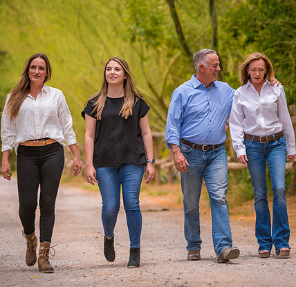 Governor Joe Lombardo walking with his wife and daughters